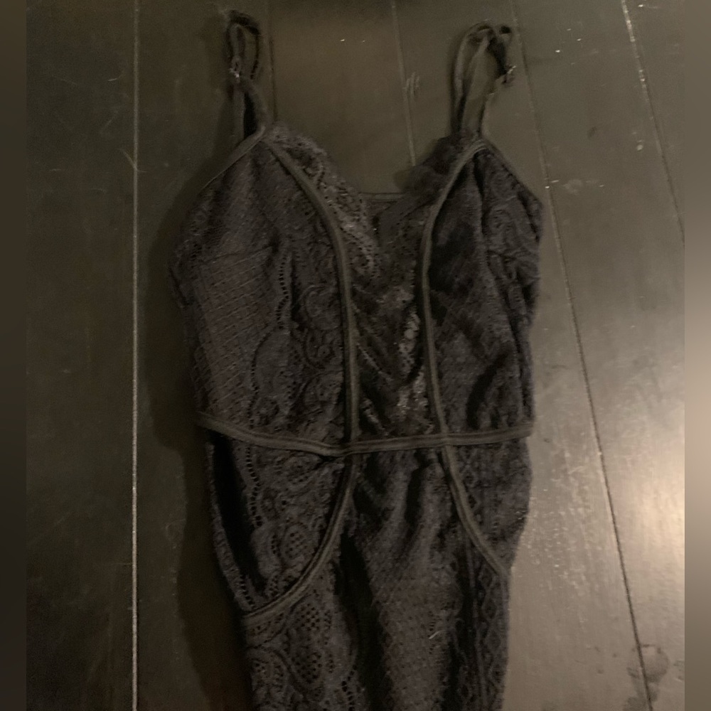 Small black laced woman’s one piece